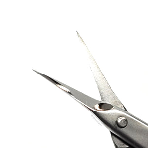 Opening of the cuticle scissors. Very thin and fine points make maneuvering around the nail easy.